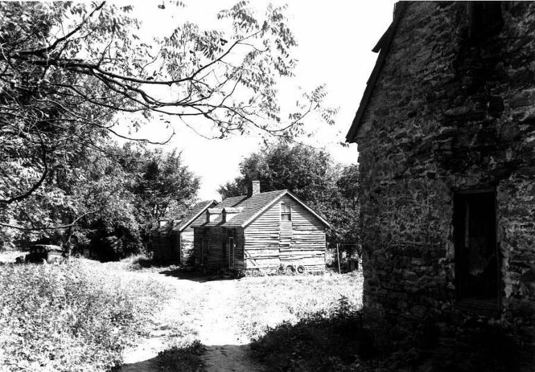 Enslaved quarters at Doughregan Manor, owned by Charles Carroll of Carrollton, near Ellicott City. No evidence has been found of the enslaved quarters at Mount Clare. Photograph by E. H. Pickering, 1935.