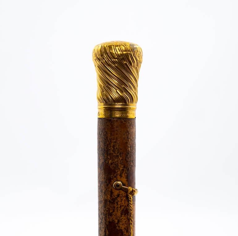 The Barrister’s George III walking stick with a gold handle engraved with an eagle and his cipher of intertwined C’s, c 1770.