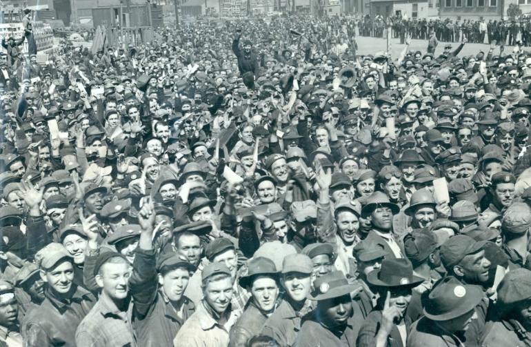 Bethlehem Steel Workers celebrate a triple launch of warships at Sparrow’s Point in 1942.